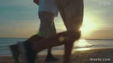 斯坦尼康镜头的父亲和成年的儿子跑在海边的清晨